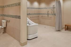 A large bathroom with a shower at Houston Transitional Care