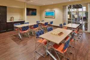 Tables with checker boards at Houston Transitional Care
